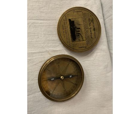 A BRASS COMPASS WITH ENGRAVING RELATING TO THE TITANIC 