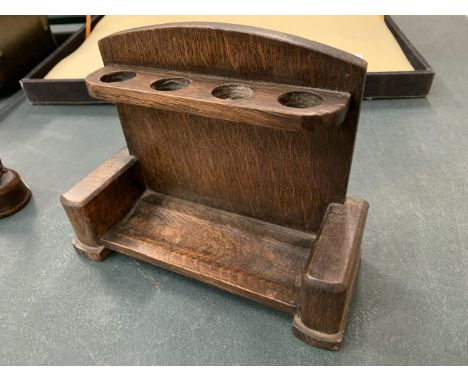 AN OAK PIPE STAND 