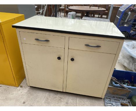 AN ENAMEL KITCHEN UNIT ENCLOSING TWO CUPBOARDS AND TWO DRAWERS 