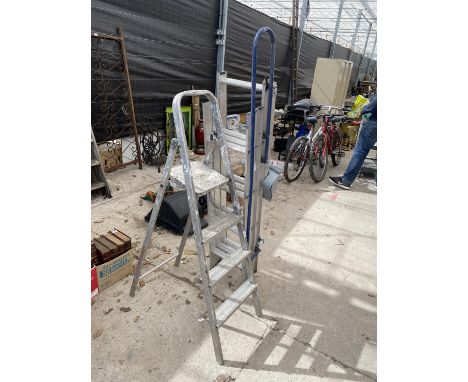 A THREE RUNG STEP LADDER AND A LOFT LADDER 