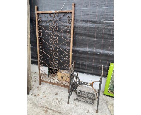 A SECTION OF DECORATIVE WROUGHT IRON RAILING AND A SINGER TREADLE BASE 