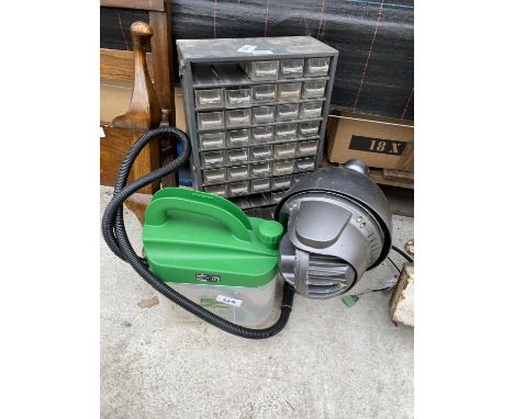 A SPOT LIGHT, A HARDWARE STORAGE UNIT AND A GARDEN SPRAYER 