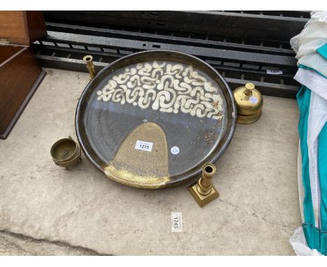 A LARGE CERAMIC DISH, TWO BRASS CANDLESTICKS, A BRASS BELL ETC 