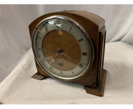 AN OAK MANTEL CLOCK WITH HALLMARKED SILVER PLATE STAMP ' ST PATRICK'S CLUB 1924 - 25' 