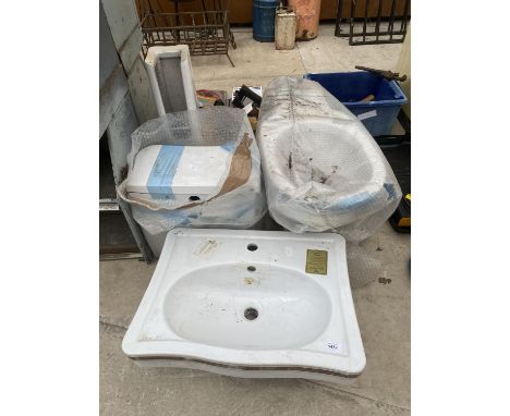 A PEDESTAL WASH BASIN AND A TOILET 
