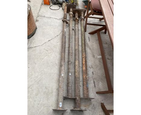 A GROUP OF FOUR ACRO PROPS 