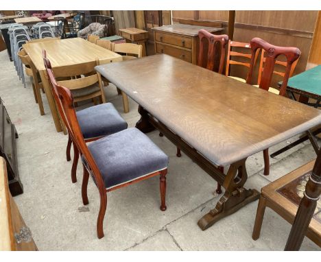 AN ERCOL STYLE ELM REFECTORY TABLE AND FOUR MAHOGANY DINING CHAIRS 