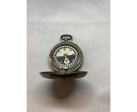 A WHITE METAL POCKET WATCH STYLE COMPASS 