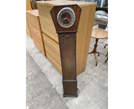 AN OAK GRANDMOTHER CLOCK 