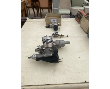 THREE MODEL PLANE ENGINE PARTS 
