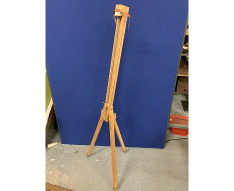 A WOODEN EASEL 