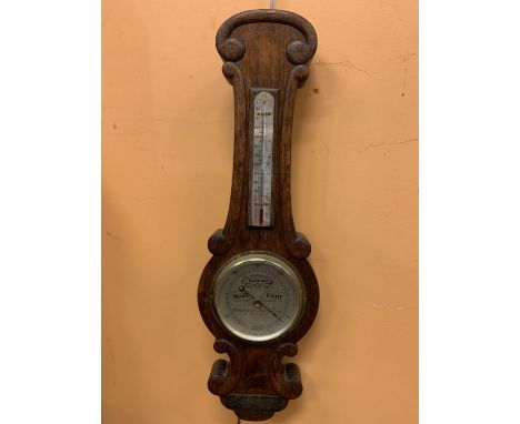 A WALLHANGING BAROMETER INCLUDING THERMOMETER 620 MM HIGH 