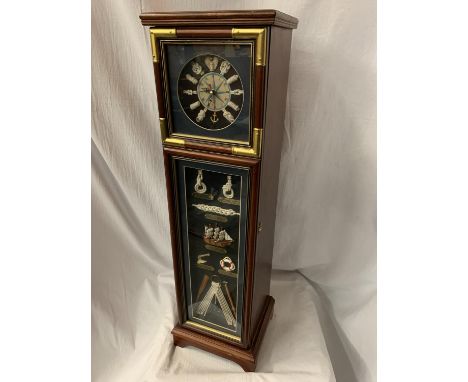 A TALL NAUTICAL CLOCK INCORPORATING FIVE INTERNAL SHELVES AND A COMPASS H: 80CM 
