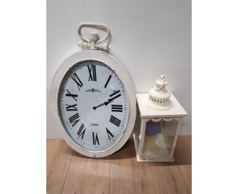 A CANDLE LANTERN TOGETHER WITH PARIS TIN METAL OVAL SHAPED WALL HANGING CLOCK