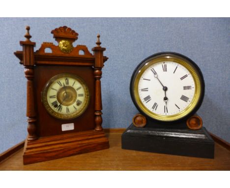 A 19th Century American oak shelf clock and an ebonised mantel clock 