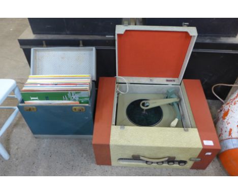 A Stella record player and records 
