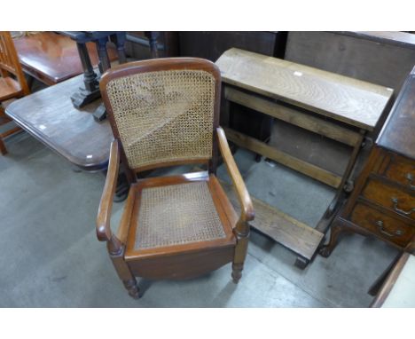 An oak prayer stand and a commode chair 