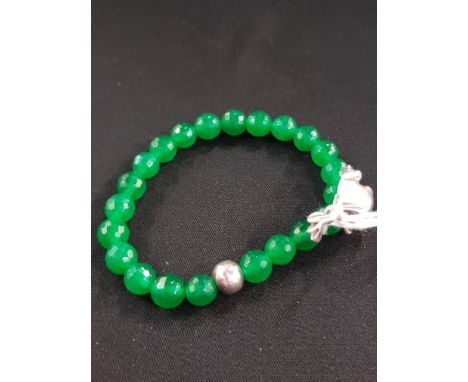 GREEN BANGLE WITH FROG CHARM