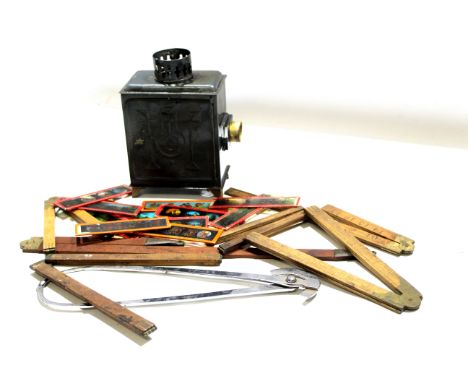 Box of various vintage slide rules, magic lantern and slides etc  