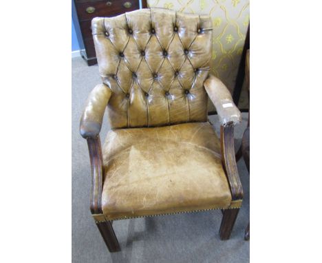 Mahogany framed and faded tan leather upholstered button back armchair with brass studded detail (for restoration)  