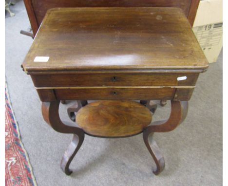 Late Georgian rosewood work table, the hinged lid opening to reveal a mirror under and sectional dividers, drawer under, four