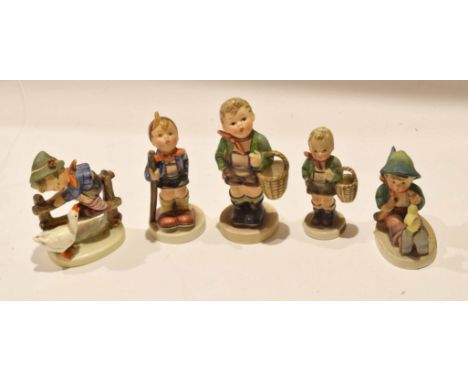 Group of Goebel figures modelled by Hummel, two of the village boy and other children figures  