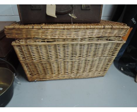 A large vintage wicker hamper