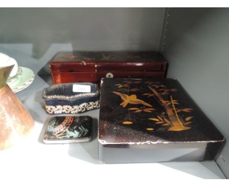 A selection of vintage lacquer trinket and jewellery boxes 