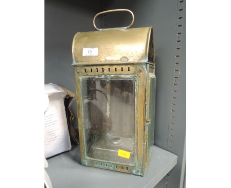 A brass lantern/carriage lamp