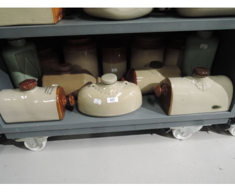 A selection of vintage stone ware warmers and heaters