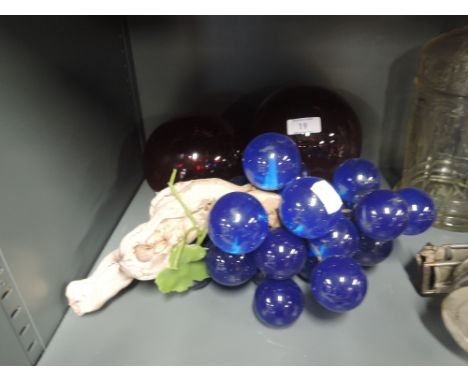 A selection of vintage decorations including red glass balls or fishing floats etc
