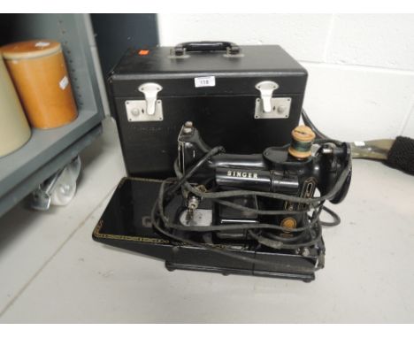 A vintage Singer sewing machine in case, model 222K