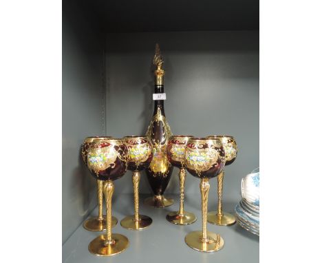 A Venetian style glass decanter and six goblets