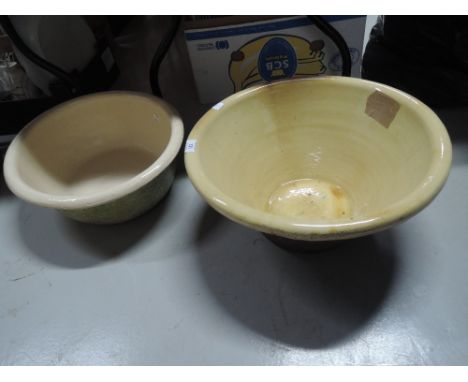 A vintage stoneware dough type bowl and a pulpware bowl