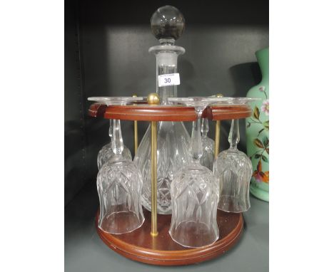 A cut glass decanter and glass set