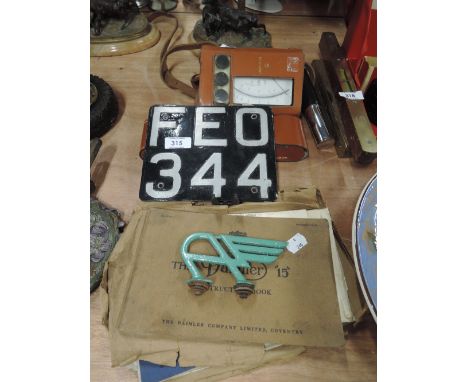 A selection of vintage automobile and motor related items including license plate and Austin hood badge possibly A35