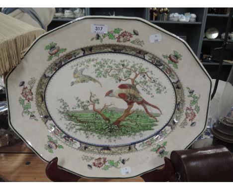 A vintage ceramic charger plate by Royal Doulton Pekin pattern