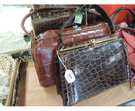 Four vintage lady's brown textured leather handbags including crocodile style and a The Martin bag