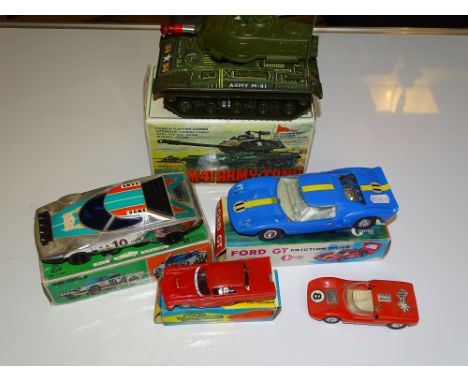 A group of friction drive cars (mainly HONG KONG examples) together with a battery operated M-41 Army Tank - G/VG in G boxes 