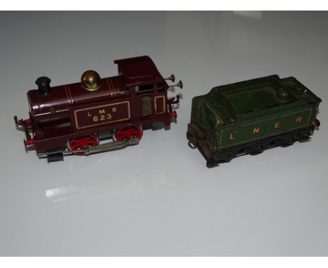 O Gauge Model Railways: A HORNBY SERIES No.1 Clockwork 0-4-0 tank engine in LMS marron livery numbered 623, together with a N
