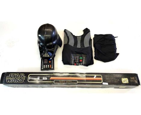 A 2003 replica Darth Vader Force FX Lightsaber, in original box with stand by Master Replicas. Features realistic metal hilt,