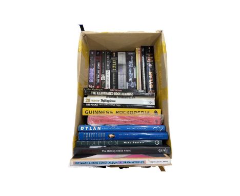 A mixed lot of boxed books: Rock'n'roll interest, to include Bob Dylan, The police, Eric Clapton, The Rolling Stones etc