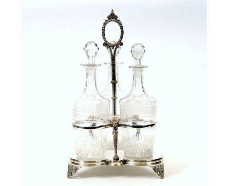 A THREE BOTTLE ELECTROPLATED DECANTER WAITER  with animal supports, on bracket feet, the bottles with Greek key decoration