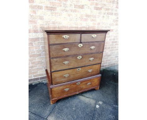 A MAHOGANY CHEST OF TWO SHORT AND THREE LONG DRAWERS  on base fitted with further drawer, on bracket feet 98cm wide 56cm deep