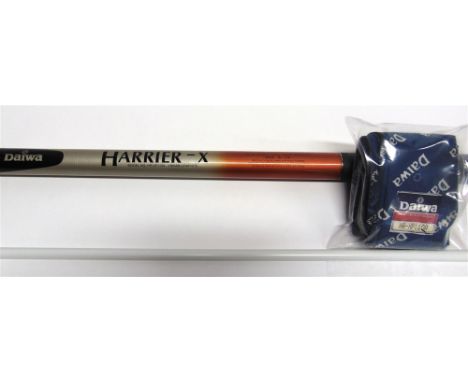 A DAIWA 'HARRIER-X' GRAPHITE FISHING POLE  model number HR-XP110A, total length 11.0m, reinforced with whisker and 'double ri