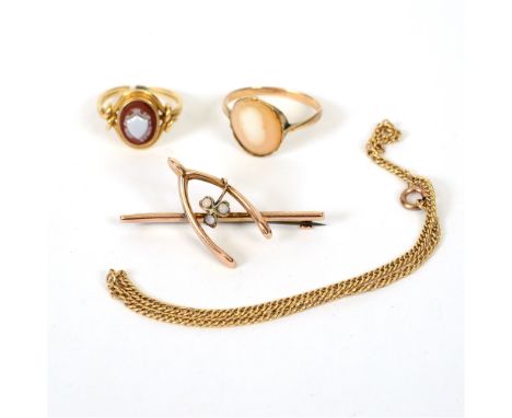 A 9 CARAT WISHBONE BAR BROOCH  enclosing a clover leaf set with opals, Birmingham 1912, cased, a late Victorian sardonyx ring