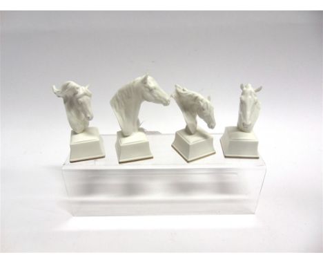 FOUR ROYAL WORCESTER HORSES HEADS on square plinth with gilt rims, each named on the base, 'Phlegon'; 'Chronos'; 'Aethon'; an