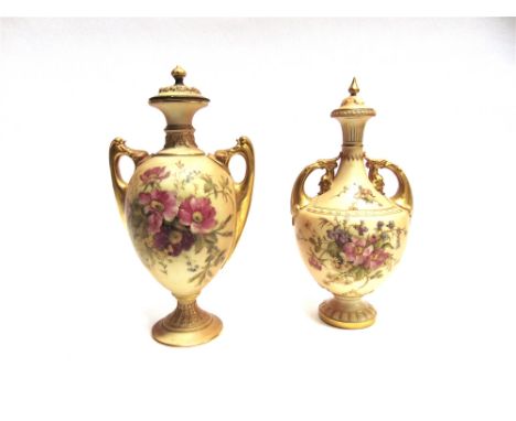 TWO ROYAL WORCESTER BLUSH IVORY LIDDED VASES  each with floral painted decoration, one pattern 2158 28cm high (lid chipped), 