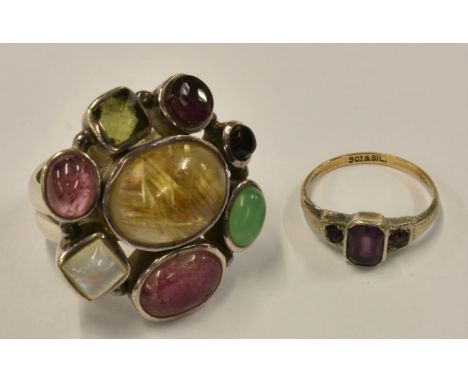 A silver and multi-gem set ring including rutilated quartz, chrysoprase and peridot, together with a silver and amethyst ring