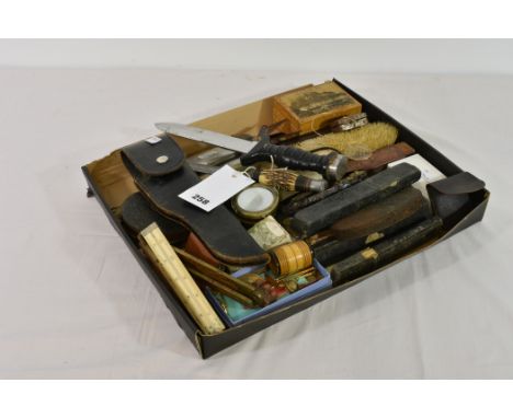 A rummage tray of mainly vintage/antique gentleman's collectibles to include sovereign scales, tape measures, rulers, razors,